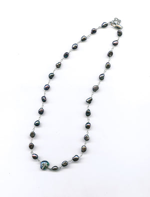 Simple cross dark pearl sample