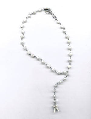 Cross tooth lariat sample